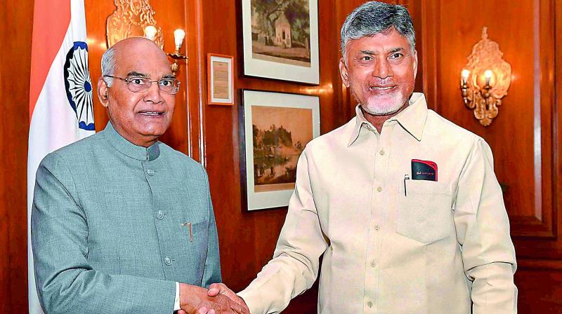 President Ram Nath Kovind with Andhra Pradesh Chief Minister N. Chandrababu Naidu at Rashtrapati Bhavan in New Delhi on Tuesday. (Photo: PTI) President Ram Nath Kovind with Andhra Pradesh Chief Minister N. Chandrababu Naidu at Rashtrapati Bhavan in New Delhi on Tuesday. (Photo: PTI)