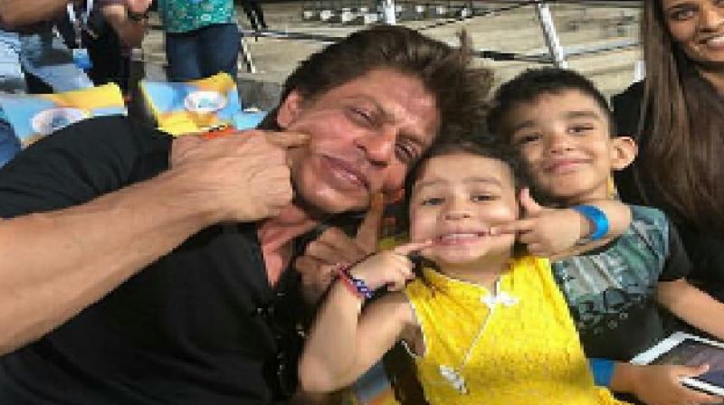 In the picture, Dhoni’s daughter Ziva is seen in cheerful mood, while sharing the frame with King Khan. (Photo: Twitter / CSK Fan Club) In the picture, Dhoni’s daughter Ziva is seen in cheerful mood, while sharing the frame with King Khan. (Photo: Twitter / CSK Fan Club)