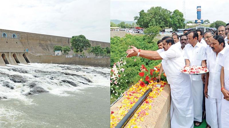 Chief Minister Edappadi K. Palaniswami offers flowers after opening the sluice gates of the Mettur reservoir for agriculture operations on Thursday. The dam was opened for the first time after the constitution of the Cauvery Management Board, to facilitate the Delta farmers to raise the paddy crop. (Photo:DC) Chief Minister Edappadi K. Palaniswami offers flowers after opening the sluice gates of the Mettur reservoir for agriculture operations on Thursday. The dam was opened for the first time after the constitution of the Cauvery Management Board, to facilitate the Delta farmers to raise the paddy crop. (Photo:DC)