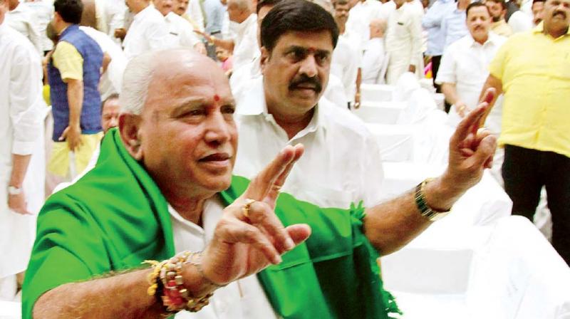 Bookanakere Siddalingappa Yediyurappa had a green shawl thrown across his shoulders as he took oath as CM watched by hundreds of his admirers and dignitaries. Bookanakere Siddalingappa Yediyurappa had a green shawl thrown across his shoulders as he took oath as CM watched by hundreds of his admirers and dignitaries.