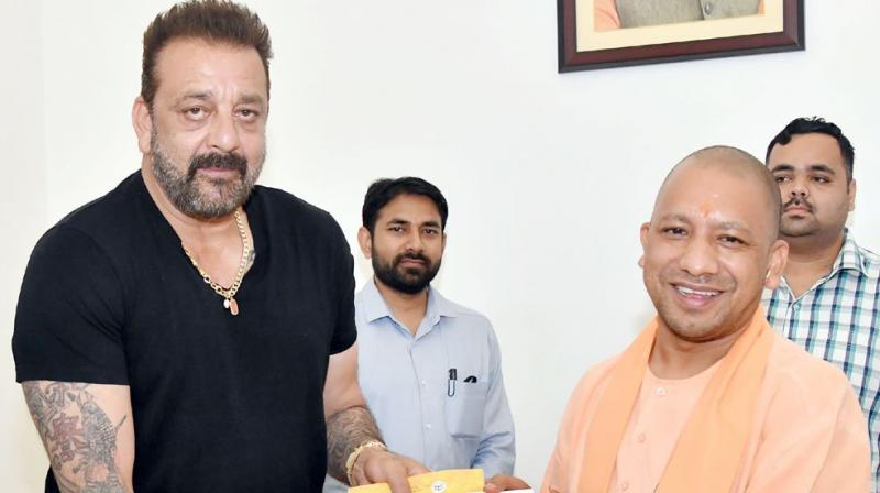 Sanjay Dutt with Yogi Adityanath. Sanjay Dutt with Yogi Adityanath.
