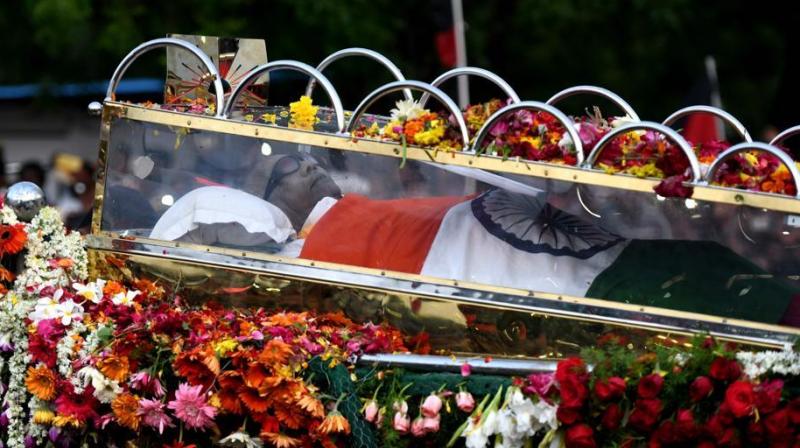 The country's high and mighty descended on the city to pay their last respects to the 'Thalaivar'. (Photo: AFP) The country's high and mighty descended on the city to pay their last respects to the 'Thalaivar'. (Photo: AFP)