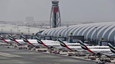 Emirates planes are parked at the Dubai International Airport in Dubai, United Arab Emirates. (AP)