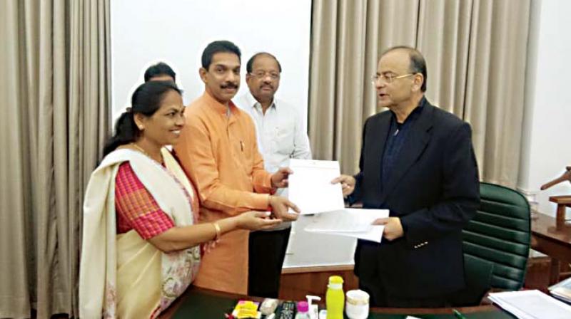 BJP MPs Nalin Kumar Kateel, Shobha Karandlaje and Maharashtra MP Gopal Shetty meet Finance Minister Arun Jaitley to request him to reconsider the merger of Vijaya Bank and Dena Bank with Bank of Baroda BJP MPs Nalin Kumar Kateel, Shobha Karandlaje and Maharashtra MP Gopal Shetty meet Finance Minister Arun Jaitley to request him to reconsider the merger of Vijaya Bank and Dena Bank with Bank of Baroda