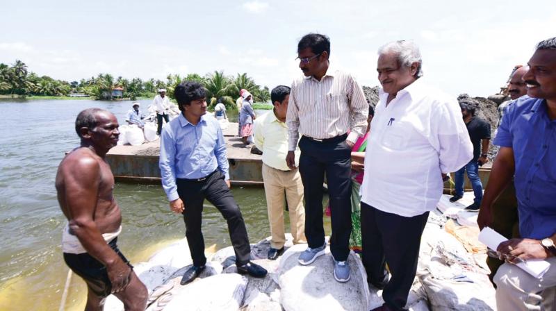 The Central team takes stock of situation at the bund breach area at Kanakassery on Tuesday. (Photo: DC) The Central team takes stock of situation at the bund breach area at Kanakassery on Tuesday. (Photo: DC)