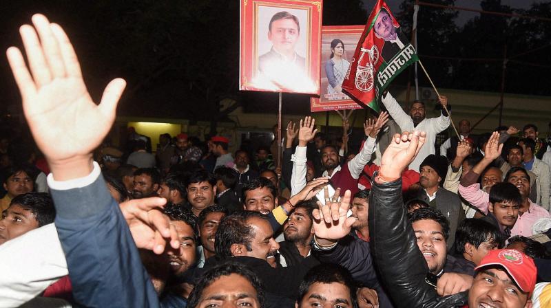 Supporters celebrate appointment of UP Chief Minister Akhilesh Yadav as national president of Samajwadi at the office in Lucknow on Sunday evening. (Photo: PTI) Supporters celebrate appointment of UP Chief Minister Akhilesh Yadav as national president of Samajwadi at the office in Lucknow on Sunday evening. (Photo: PTI)