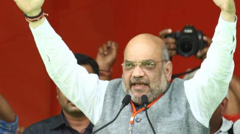 Mocking the grand opposition alliance proposed by Banerjee, Shah wondered why the Congress and CPI(M) were criticising the TMC if they were her allies. (Photo: File) Mocking the grand opposition alliance proposed by Banerjee, Shah wondered why the Congress and CPI(M) were criticising the TMC if they were her allies. (Photo: File)