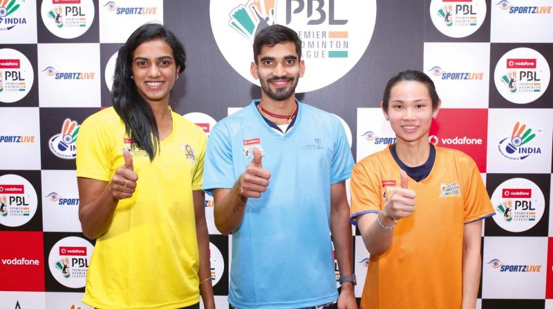 P.V. Sindhu (from left), Kidambi Srikanth and World No.1 Tai Tzu Ting pose ahead of the Dubai BWF world super series finals on Sunday. P.V. Sindhu (from left), Kidambi Srikanth and World No.1 Tai Tzu Ting pose ahead of the Dubai BWF world super series finals on Sunday.