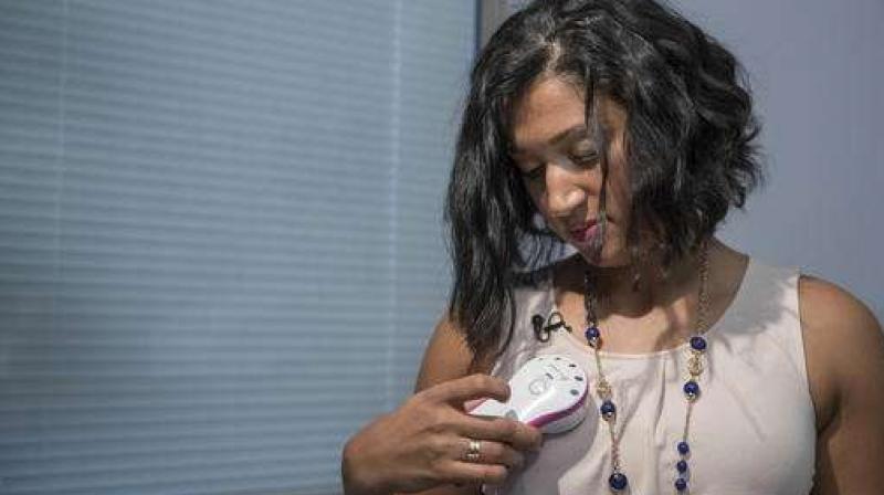 Luincys Fernandez demonstrates how she had used the AeroForm handheld dosage controller during an interview at NewYork-Presbyterian/Columbia University Medical Center. (Photo: AP) Luincys Fernandez demonstrates how she had used the AeroForm handheld dosage controller during an interview at NewYork-Presbyterian/Columbia University Medical Center. (Photo: AP)