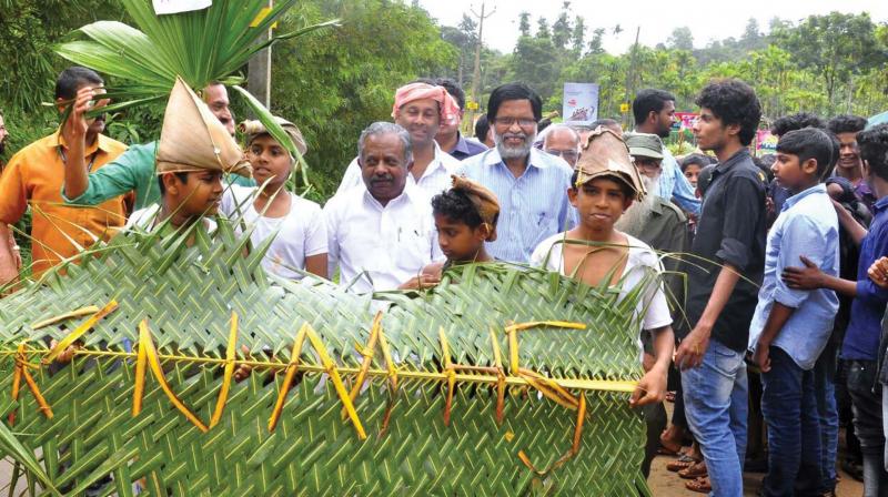 Forest minister K. Raju walks with students after inaugurating the ‘rain walk’ on Saturday. E.K. Vijayan, MLA, is also seen. Forest minister K. Raju walks with students after inaugurating the ‘rain walk’ on Saturday. E.K. Vijayan, MLA, is also seen.