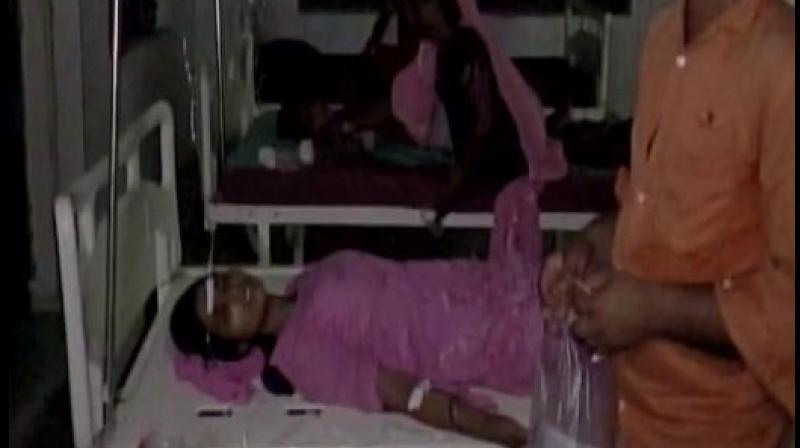 People fall ill after breaking their daily Ramzan fast at a madrassa in Harwatand village at Bahraich in UP. Photo: ANI Twitter) People fall ill after breaking their daily Ramzan fast at a madrassa in Harwatand village at Bahraich in UP. Photo: ANI Twitter)