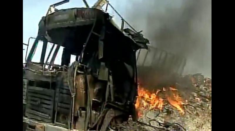 Irate farmers torch vehicles in protest in Madhya Pradesh. (Photo: ANI Twitter) Irate farmers torch vehicles in protest in Madhya Pradesh. (Photo: ANI Twitter)