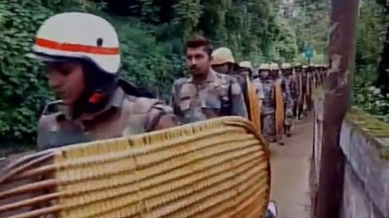 Paramilitary force patrol Darjeeling streets during the indefinite striker called by Gorkha Janmukti Morch. (Photo: ANI | Twitter) Paramilitary force patrol Darjeeling streets during the indefinite striker called by Gorkha Janmukti Morch. (Photo: ANI | Twitter)