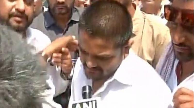 Police arrest Hardik Patel in Neemuch district of Madhya Pradesh when he was heading to Mandsaur to meet the kin of the farmers killed in police firing. (Photo: ANI | Twitter) Police arrest Hardik Patel in Neemuch district of Madhya Pradesh when he was heading to Mandsaur to meet the kin of the farmers killed in police firing. (Photo: ANI | Twitter)