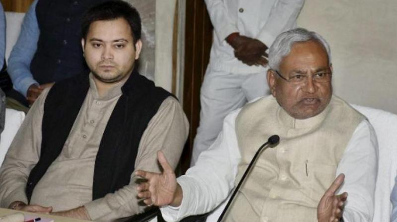 Bihar Chief Minister Nitish Kumar called Deputy Chief Minister Tejaswi Yadav in his chamber for a meeting on Tuesday. (Photo: File | PTI) Bihar Chief Minister Nitish Kumar called Deputy Chief Minister Tejaswi Yadav in his chamber for a meeting on Tuesday. (Photo: File | PTI)