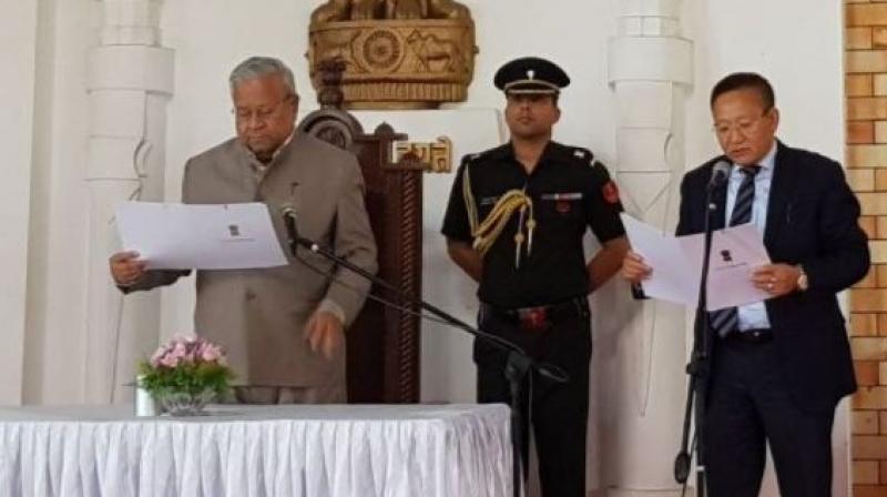 TR Zeliang sworn in as the Chief Minister of Nagaland at Darbar Hall, Raj Bhavan in Kohima. (Photo: Twitter | ANI) TR Zeliang sworn in as the Chief Minister of Nagaland at Darbar Hall, Raj Bhavan in Kohima. (Photo: Twitter | ANI)
