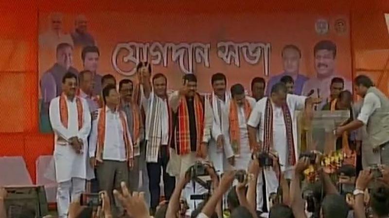 Trinamool Congress MLAs from Tripura Sudip Barman, Ashish Saha, Diba Chandra Hrangkhawl, Biswa Bandhu Sen, Pranjit Roy and Dilip Sarkar joined BJP. (Photo: ANi | Twitter) Trinamool Congress MLAs from Tripura Sudip Barman, Ashish Saha, Diba Chandra Hrangkhawl, Biswa Bandhu Sen, Pranjit Roy and Dilip Sarkar joined BJP. (Photo: ANi | Twitter)