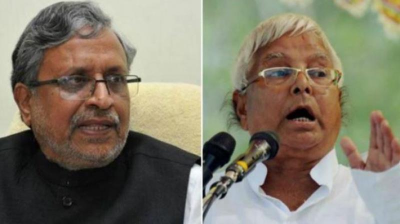 Bihar Deputy Chief Minister Sushil Kumar Modi (left) said the director of all three companies, is a 'right-hand man of Lalu Yadav (right) and was given sand mining contract in six districts of Bihar'. (Photo: File | PTI) Bihar Deputy Chief Minister Sushil Kumar Modi (left) said the director of all three companies, is a 'right-hand man of Lalu Yadav (right) and was given sand mining contract in six districts of Bihar'. (Photo: File | PTI)
