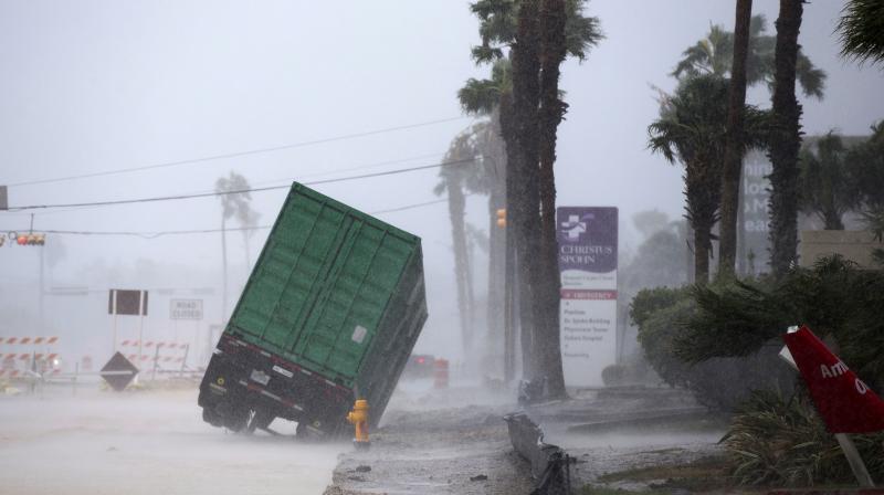 A power generator tips in front of Texas' Christus Spohn Hospital in Corpus Christi, Texas, as Hurricane Harvey hits Friday. (Photo: AP) A power generator tips in front of Texas' Christus Spohn Hospital in Corpus Christi, Texas, as Hurricane Harvey hits Friday. (Photo: AP)