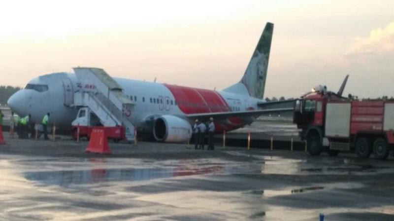 A Kochi-bound Air India flight with 102 passengers and six crew members on-board veered off the taxiway in the wee hours of Tuesday at the Kochi airport. (Photo: ANI | Twitter) A Kochi-bound Air India flight with 102 passengers and six crew members on-board veered off the taxiway in the wee hours of Tuesday at the Kochi airport. (Photo: ANI | Twitter)