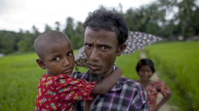 The Centre holds Rohingya Muslims in the country as illegal immigrants and that their continued stay posed serious national security ramifications. (Representational Image | AP) The Centre holds Rohingya Muslims in the country as illegal immigrants and that their continued stay posed serious national security ramifications. (Representational Image | AP)