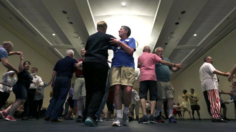 At the time, many heterosexual square dance clubs expected members to come in pairs, said Howard Richman, a member of the Times Squares, New York’s LGBTQ-friendly square dance club. (Photo: AP) At the time, many heterosexual square dance clubs expected members to come in pairs, said Howard Richman, a member of the Times Squares, New York’s LGBTQ-friendly square dance club. (Photo: AP)