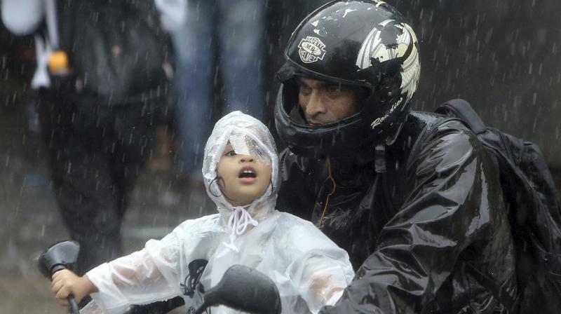 Mumbai monsoonal shower. (Photo: AP) Mumbai monsoonal shower. (Photo: AP)
