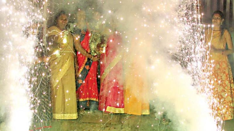 People bursting crackers on the occasion of Diwali festival in Bengaluru (Photo: DC) People bursting crackers on the occasion of Diwali festival in Bengaluru (Photo: DC)
