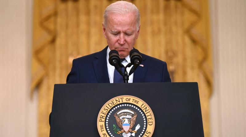 US President Joe Biden pauses as he delivers remarks on the terror attack at Hamid Karzai International Airport, and the US service members and Afghan victims killed and wounded, in White House, Washington, DC on August 26, 2021.