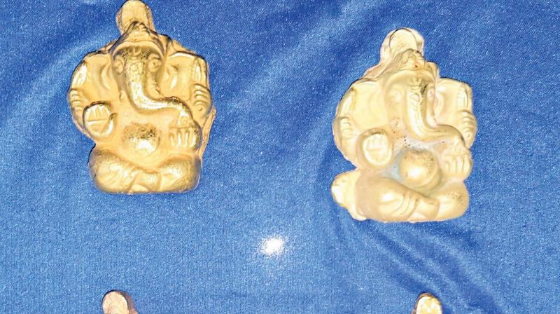 The seized gold idols. The seized gold idols.