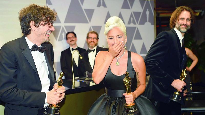 Lady Gaga receives the Best Original Song award for Shallow from A Star is Born in the 91st Annual Academy Awards Governors Ball at the Hollywood & Highland Centre in Hollywood, California, on Monday. (Photo: AFP) Lady Gaga receives the Best Original Song award for Shallow from A Star is Born in the 91st Annual Academy Awards Governors Ball at the Hollywood & Highland Centre in Hollywood, California, on Monday. (Photo: AFP)