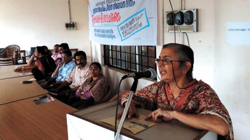 Activist K. Ajitha speaks at the open forum held at district panchayat conference hall in Kozhikode on Saturday. Activist K. Ajitha speaks at the open forum held at district panchayat conference hall in Kozhikode on Saturday.