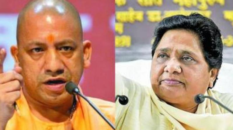 Mayawati charged that the UP chief minister was deriving political mileage by visiting temples and having food outside the house of a Dalit. (Image: File) Mayawati charged that the UP chief minister was deriving political mileage by visiting temples and having food outside the house of a Dalit. (Image: File)