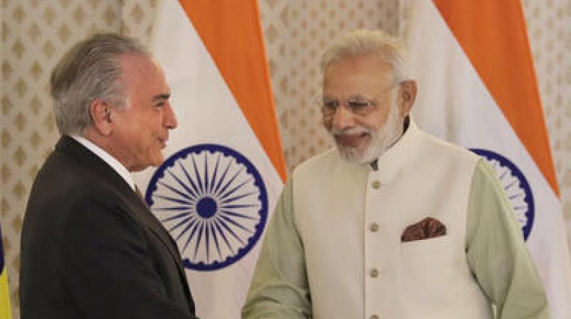 Modi said India will continue to work with Brazil as an important partner in early adoption of the Comprehensive Convention on International Terrorism (CCIT). (Photo: AP) Modi said India will continue to work with Brazil as an important partner in early adoption of the Comprehensive Convention on International Terrorism (CCIT). (Photo: AP)