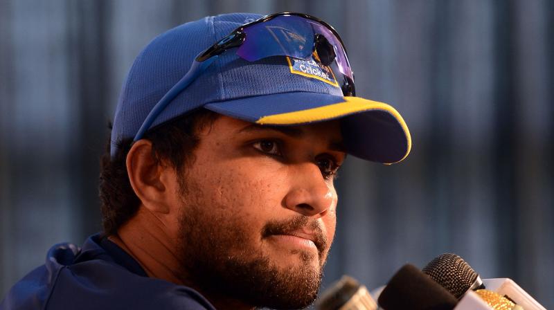 Chandimal pleaded not guilty to the charge, before attending the hearing where match referee Javagal Srinath, after utilising the time available to him under the code to make his decision, handed Chandimal the maximum punishment, which was two suspension points and a fine of 100 percent of his match fee. (Photo: AFP) Chandimal pleaded not guilty to the charge, before attending the hearing where match referee Javagal Srinath, after utilising the time available to him under the code to make his decision, handed Chandimal the maximum punishment, which was two suspension points and a fine of 100 percent of his match fee. (Photo: AFP)