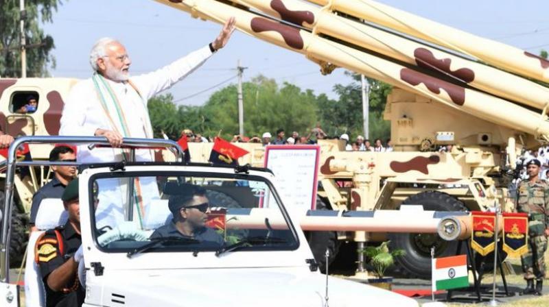 PM Modi was accompanied by Defence Minister Nirmala Sitharaman and Rajasthan Chief Minister Vasundhara Raje. (Photo: Twitter | @PIB_India) PM Modi was accompanied by Defence Minister Nirmala Sitharaman and Rajasthan Chief Minister Vasundhara Raje. (Photo: Twitter | @PIB_India)