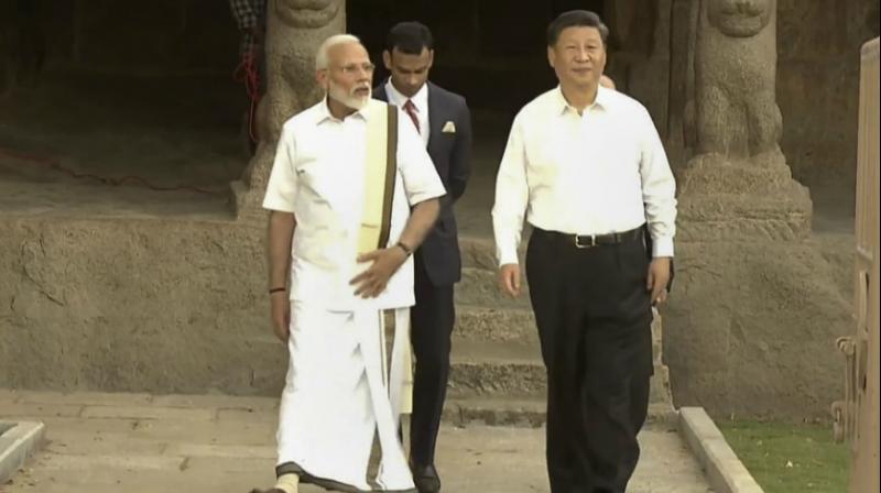 The Chinese leader wore a full sleeve white shirt and black trousers. (Photo: PTI) The Chinese leader wore a full sleeve white shirt and black trousers. (Photo: PTI)