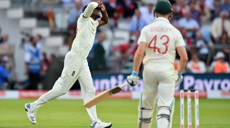 England fast bowler Jofra marked his Test debut with a wicket as Australia suffered a top-order collapse at Lord's on Friday. (Photo:AFP) England fast bowler Jofra marked his Test debut with a wicket as Australia suffered a top-order collapse at Lord's on Friday. (Photo:AFP)