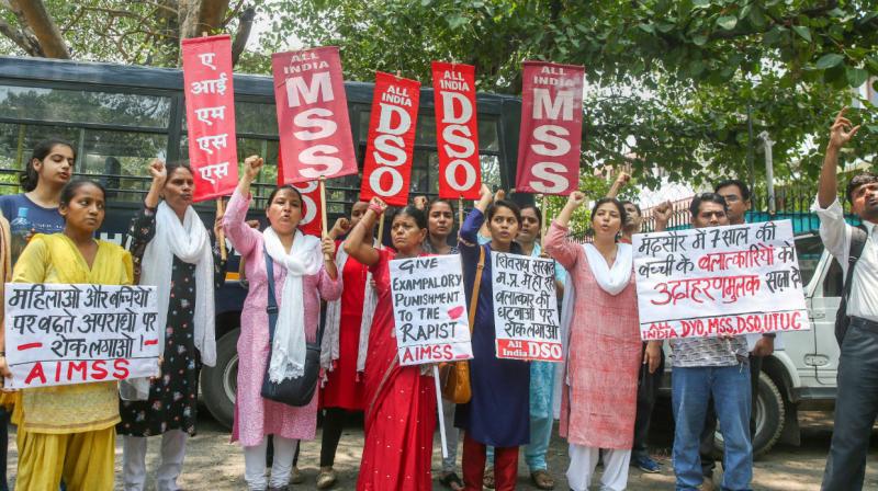 Protests erupted over the abduction and rape of an 8-year-old girl in Mandsaur. (Photo: PTI) Protests erupted over the abduction and rape of an 8-year-old girl in Mandsaur. (Photo: PTI)