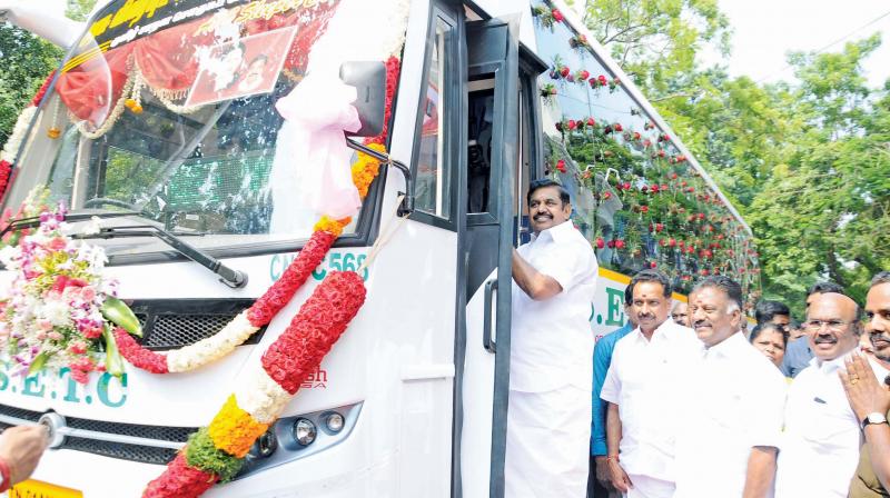 Chief Minsiter Edappadi K Palaniswami boarding one of the new buses. (Photo: DC) Chief Minsiter Edappadi K Palaniswami boarding one of the new buses. (Photo: DC)