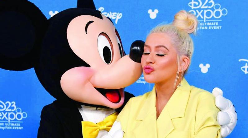 Christina Aguilera was honoured as a Disney Legend. Christina Aguilera was honoured as a Disney Legend.