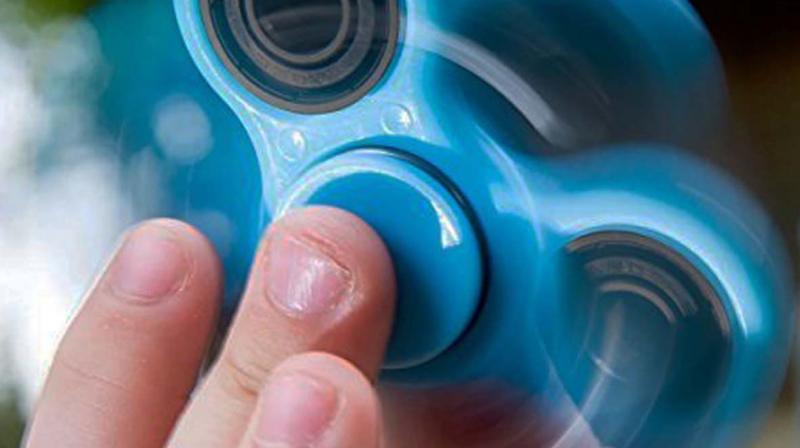 Your children probably don’t need to be told that the fidget spinner is a small toy of metal and plastic usually with three blades with a spinning wheel in the centre. Your children probably don’t need to be told that the fidget spinner is a small toy of metal and plastic usually with three blades with a spinning wheel in the centre.