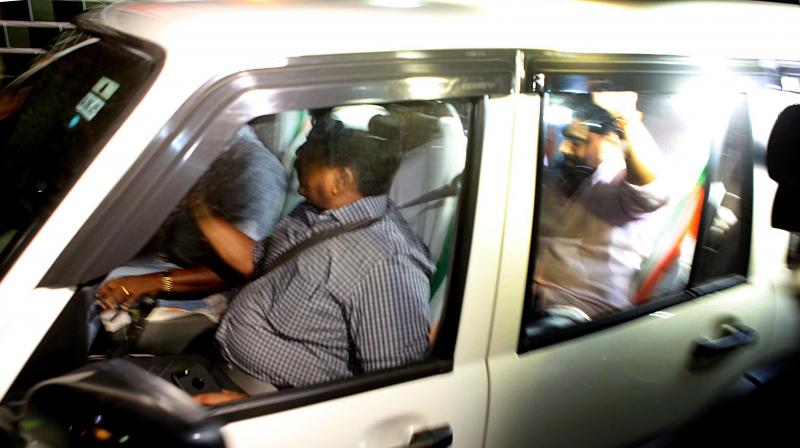 Dileep being brought to Aluva Police club on Monday night. Rural SP, A.V. George, (L) is also seen. Dileep being brought to Aluva Police club on Monday night. Rural SP, A.V. George, (L) is also seen.