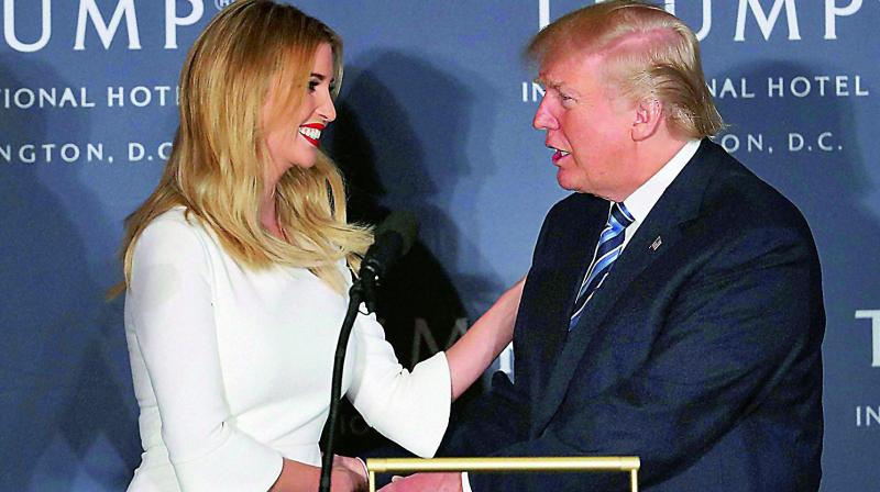Republican presidential candidate Donald Trump and his daughter Ivanka Trump during the opening of Trump International Hotel in Washington. Republican presidential candidate Donald Trump and his daughter Ivanka Trump during the opening of Trump International Hotel in Washington.