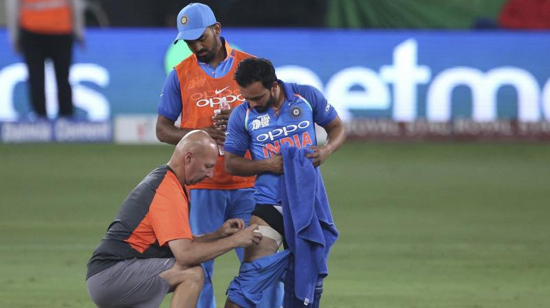 Kedar Jadhav was looked into by the physio Patrick Farhart and decided to continue batting before he went off soon after. (Photo: AP) Kedar Jadhav was looked into by the physio Patrick Farhart and decided to continue batting before he went off soon after. (Photo: AP)
