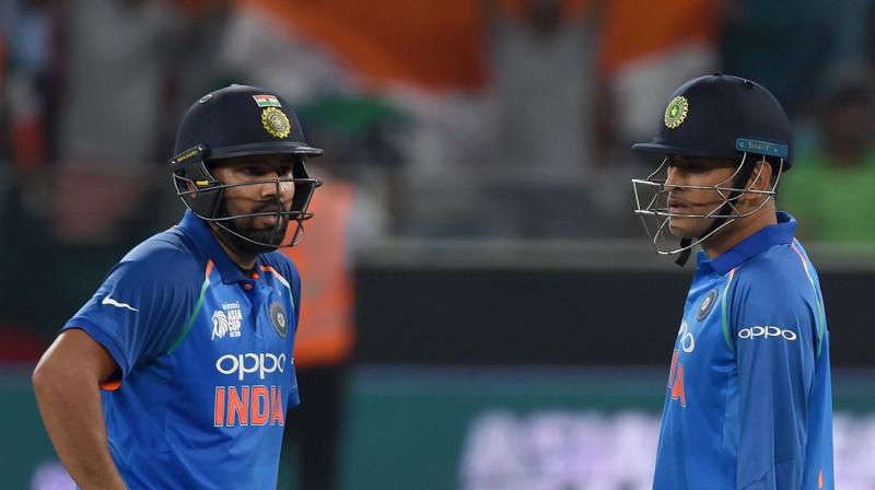 "Whatever I have seen of him (Dhoni) leading the side for all these years, he never panicked, took time while taking decisions. There are those similarities in me too," skipper Rohit told mediapersons on Saturday. (Photo: AFP) "Whatever I have seen of him (Dhoni) leading the side for all these years, he never panicked, took time while taking decisions. There are those similarities in me too," skipper Rohit told mediapersons on Saturday. (Photo: AFP)