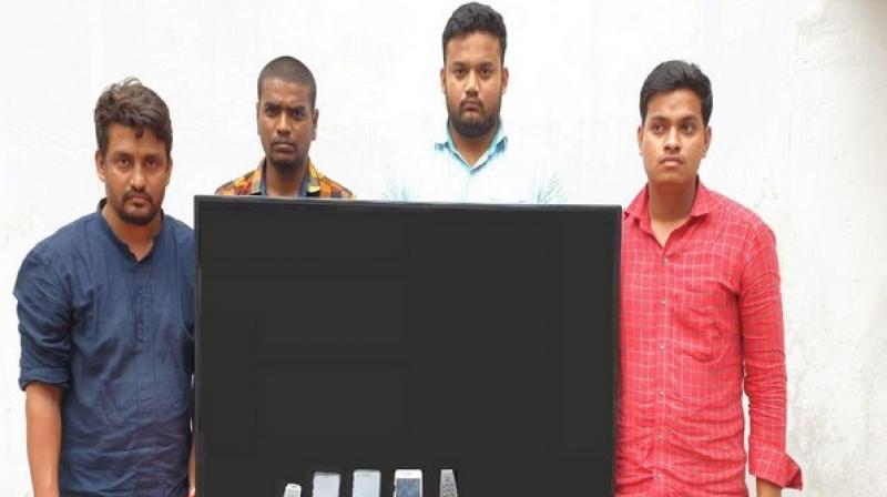 A television, five mobile phones and Rs 26, 600 in cash were seized from the accused. (Photo: ANI) A television, five mobile phones and Rs 26, 600 in cash were seized from the accused. (Photo: ANI)