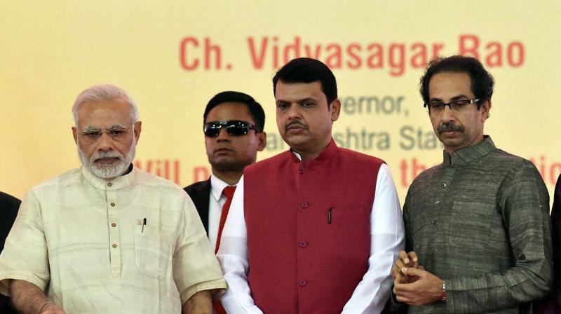 Prime Minister Narendra Modi alongwith, Maharashtra CM Devendra Fadnavis and Shiv Sena President Uddhav Thackarey. (Photo: PTI) Prime Minister Narendra Modi alongwith, Maharashtra CM Devendra Fadnavis and Shiv Sena President Uddhav Thackarey. (Photo: PTI)