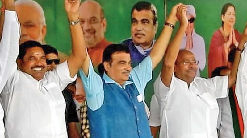 Union minister Nitin Gadkari (second left), Chief Minister E. K. Palaniswami (first left) and PMK chief S. Ramadoss during an election campaign rally in Salem on Sunday. (DC) Union minister Nitin Gadkari (second left), Chief Minister E. K. Palaniswami (first left) and PMK chief S. Ramadoss during an election campaign rally in Salem on Sunday. (DC)