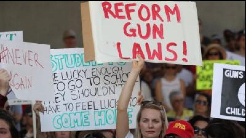The initial EU proposal provoked an outcry because it meant a ban on the Swiss tradition of ex-soldiers keeping their assault rifles. (Photo: AFP) The initial EU proposal provoked an outcry because it meant a ban on the Swiss tradition of ex-soldiers keeping their assault rifles. (Photo: AFP)